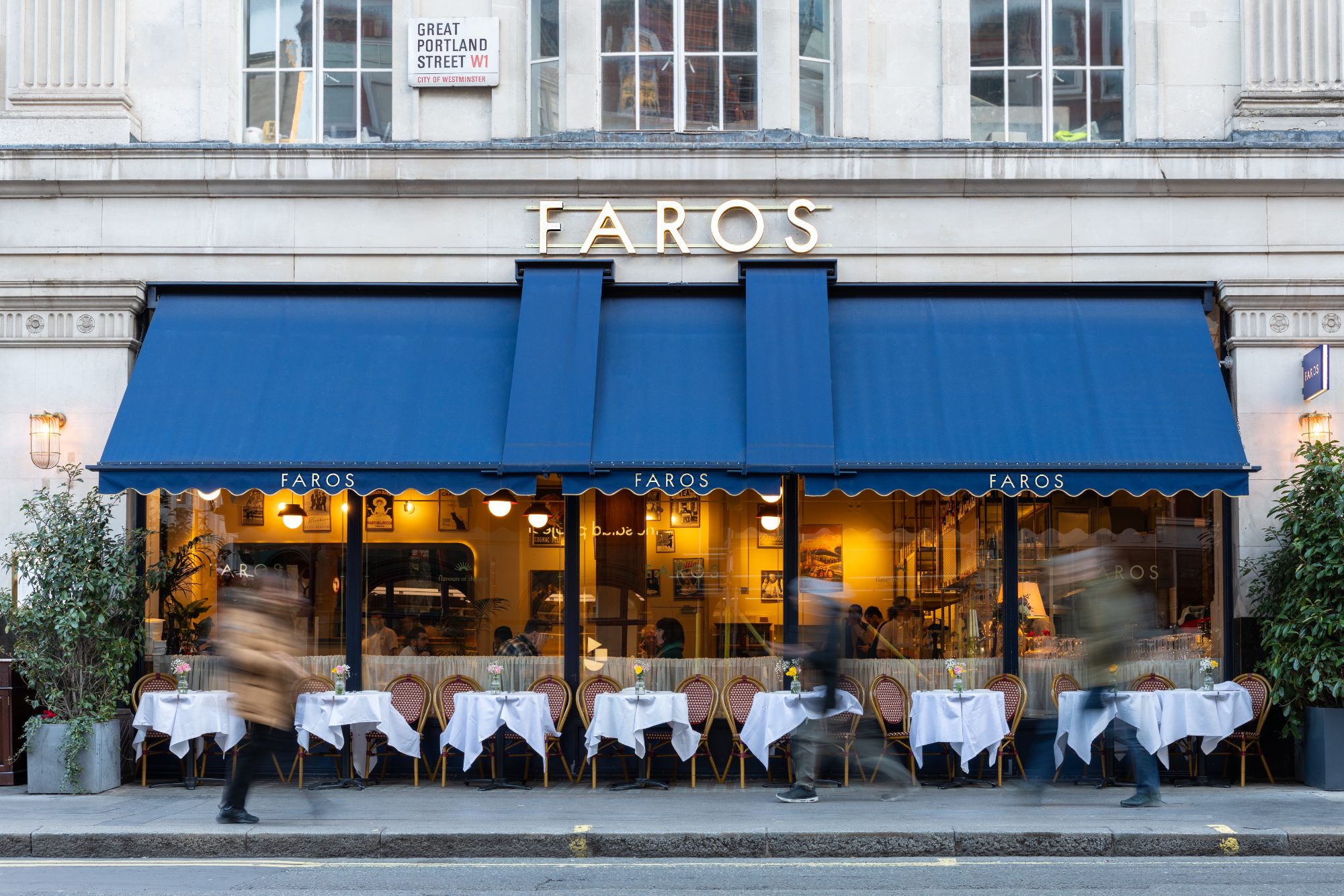Faros shopfront on Great Portland Street: timber frame, glazing, signage surround and blue awnings